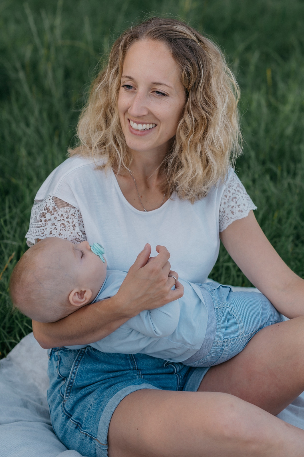 Familienshooting in Muenchen, Mutter mit Baby